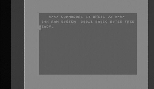 The Commodore BASIC screen in two shades of grey.